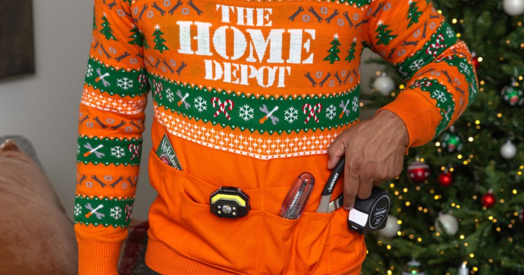Home Depot holiday sweater with tools and a gift card displayed.