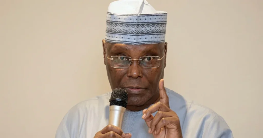 Atiku Abubakar addressing a crowd during a political event.