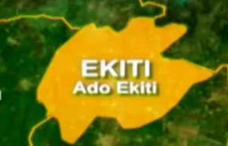 Aerial view of lush green hills and educational facilities in Ekiti State, Nigeria.