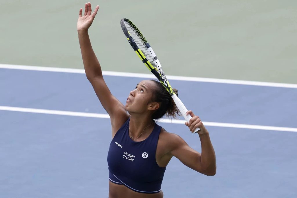 Professional tennis player in action on court during a tournament match