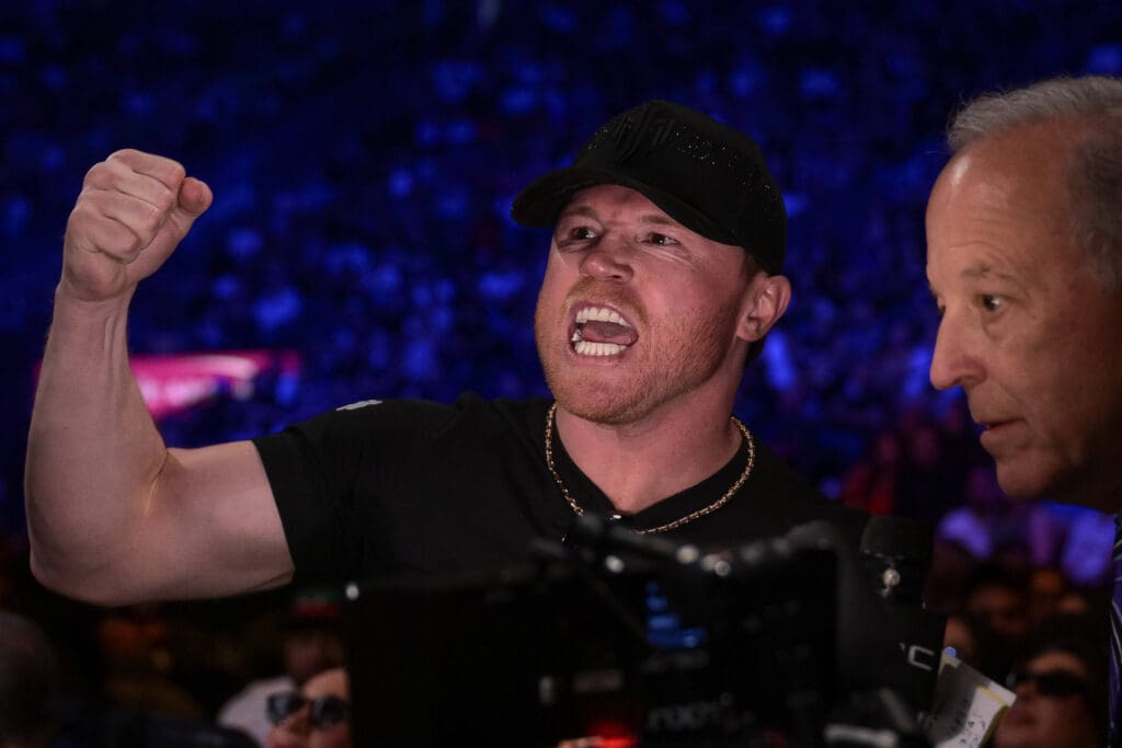 Canelo Alvarez in a boxing ring preparing for a fight