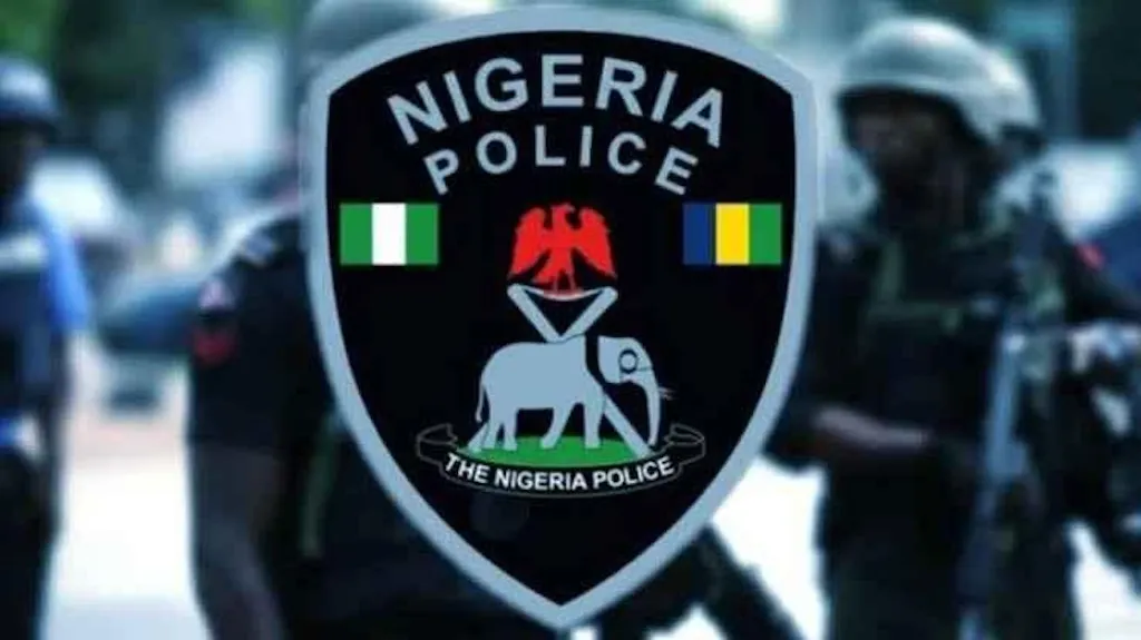 Police vehicles parked outside a command station in Nigeria.