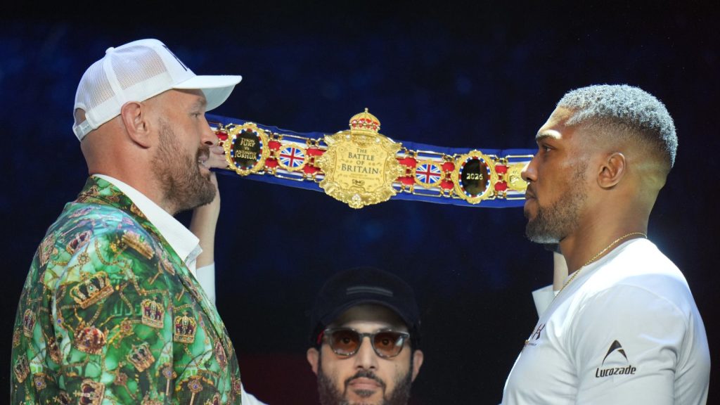 Tyson Fury and Anthony Joshua promotional graphic for their upcoming fight in Cardiff.